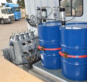 The blue round steel tanks for oil and TECALEMIT unit (grey) with 5 x hose reels and waste-oil pump. Lube Truck. Made in Germany, Europe.